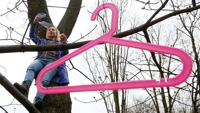 A coat hanger, symbol of illegal abortion, at a protest against a proposed abortion ban in Warsaw, Poland, April 9, 2016.