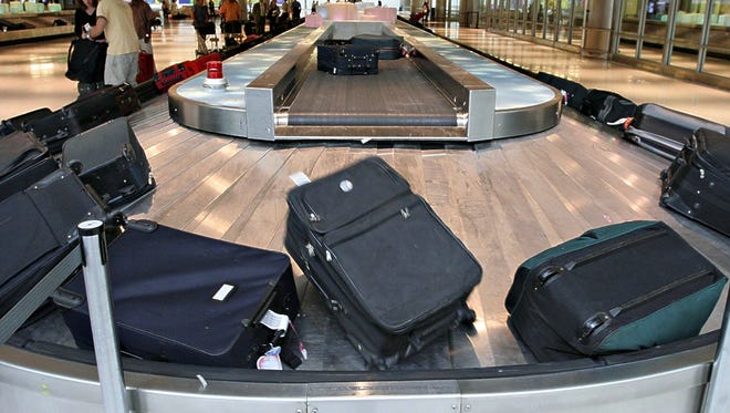 Whose suitcase is whose? Hard to tell when they pretty much all look alike.
