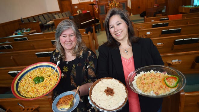 Sheila Simmons, right, and her mother, Anita Musgrove, partnered to put together "Mississippi Church Suppers," — a collection of recipes from small Baptist churches across the state. Among the dishes are Macaroni Salad, from left, 4 Ingredient Butterscotch Cake, Peanut Butter Bacon Pie and Crawfish Mexicala.