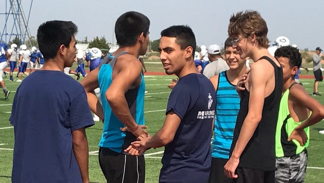 Lake View's Tomas Briones, middle facing left, is a returning state cross country qualifier for the Chiefs.