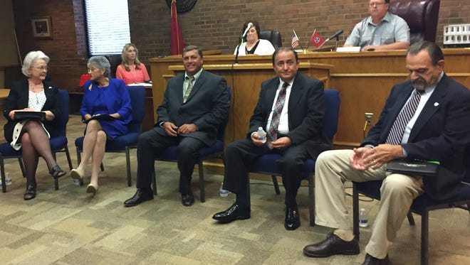 Cheatham County Mayor candidates Amber Locke, far left, Mary MacRae, James Gupton Jr., Kerry McCarver and John Haines wait to answer questions from the county commission Thursday night.