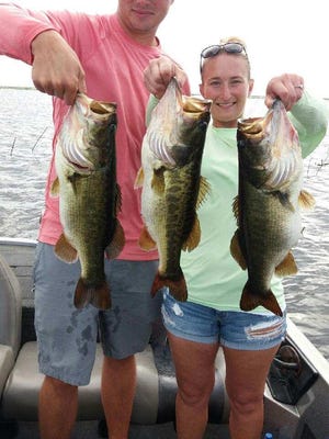 Eric Lepontois and Crystal Thompson of Ohio caught and released these bass while fishing last week with Capt. Mike Shellen of Okeechobeebassfishing.com.