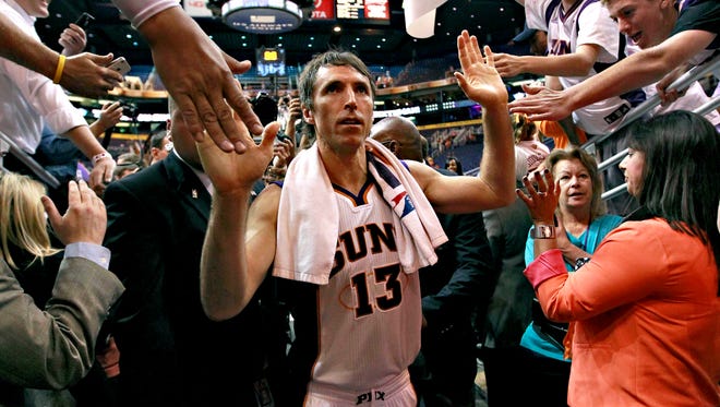 Phoenix Suns guard Steve Nash leaves the court  after an NBA basketball game against the San Antonio Spurs, on Wednesday, April 25, 2012, in Phoenix.