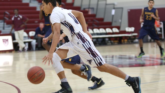 Pierce Sterling of La Quinta brings the ball up court during their win against Warren at the MaxPreps Holiday Classic in Rancho MIrage, December 29, 2016. 