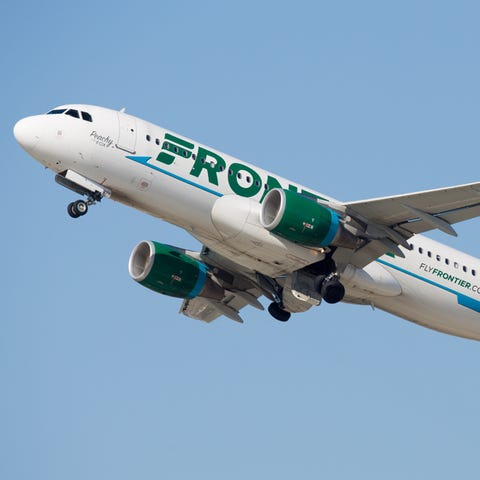 A Frontier Airlines Airbus A320neo takes off from...
