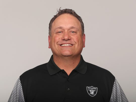 FILE - In this June 2017 file photo, John Pagano of the Oakland Raiders NFL football team poses for a photo. The Raiders play the Denver Broncos this week. Raiders coach Jack Del Rio fired defensive coordinator Ken Norton Jr. and gave the play-calling duties to assistant Pagano in hopes that the new leadership will lead to a more aggressive, opportunistic defense. (AP Photo/File)
