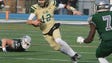 St. Joseph quarterback Nick Patti runs the ball in