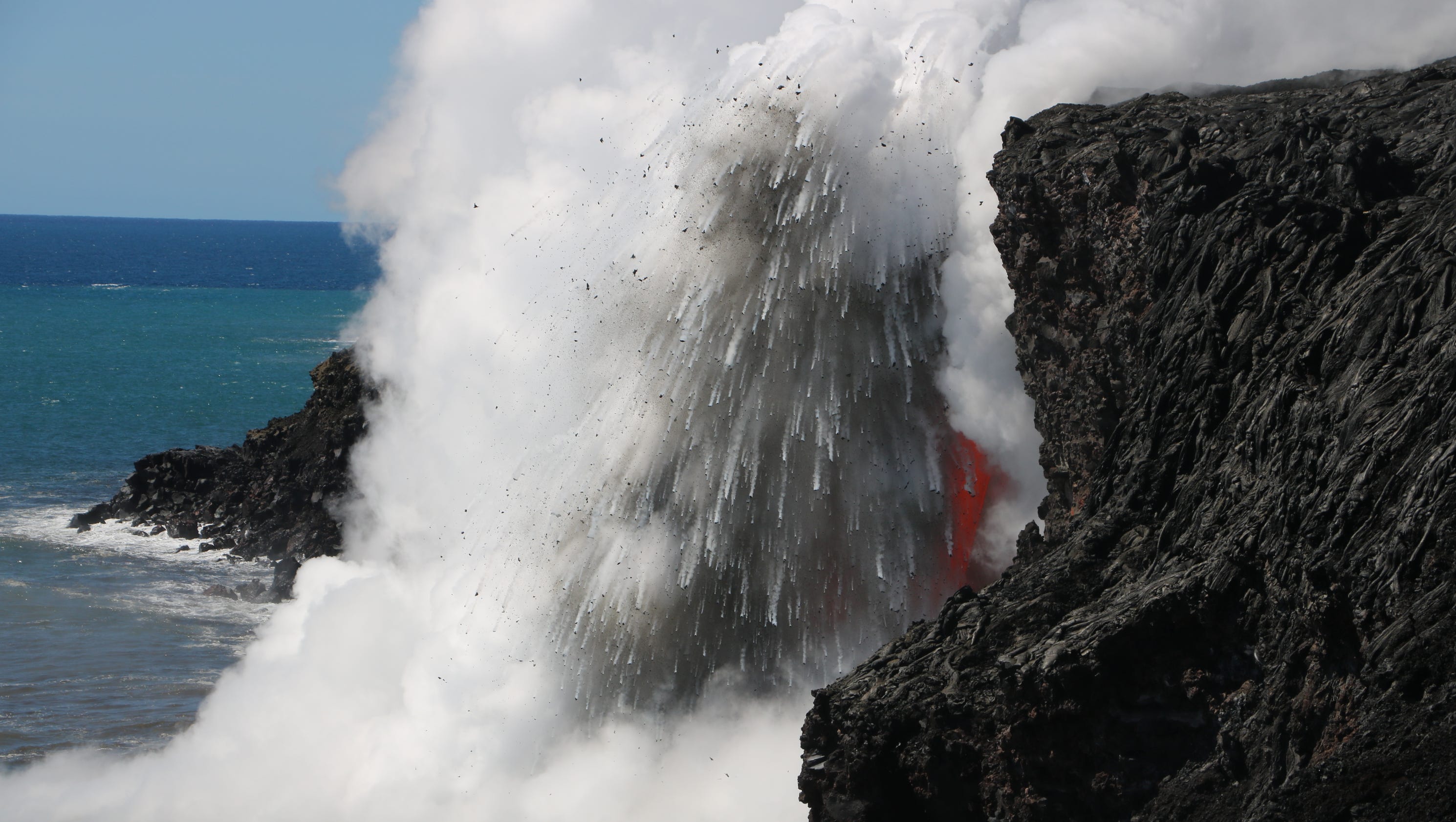 Lava spews off Hawaii into Pacific Ocean, causing explosions