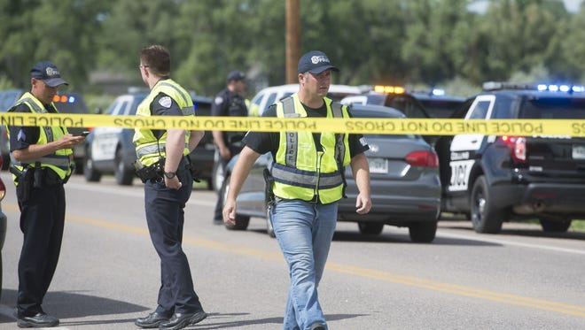 A cyclist was severely injured and later died after an accident involving an SUV and a truck pulling a trailer occured about one quarter of a mile north of the intersection of E. Vine Drive and S. Lemay Avenue. Saturday, June 6, 2015.  Austin Humphreys/The Coloradoan