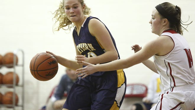 Port Huron Northern sophomore Sami Klink works the ball down court during a basketball game Tuesday, Dec. 8, 2015 at Port Huron High School.