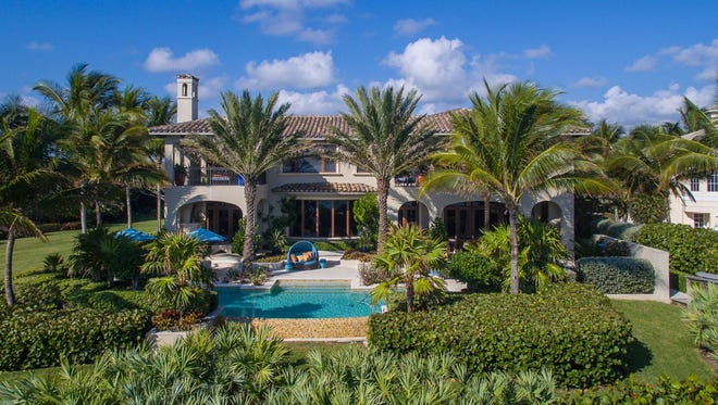 This 13,514-square-foot home at 10 Ocean Lane in Indian River Shores has six bedrooms and seven full and three half bathrooms on a 1.3-acre lot with 108 feet of ocean frontage.