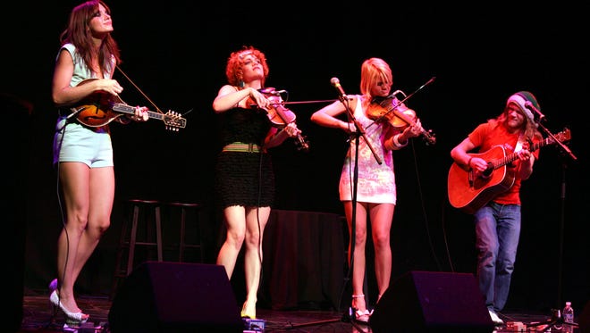 In a 2008 file image, members of the Bluegrass–rock band Jypsi, from left, Scarlett, Lillie Mae, Amber–Dawn and Frank Rische, at the Morongo Casino and Resort in Cabazon, Calif.