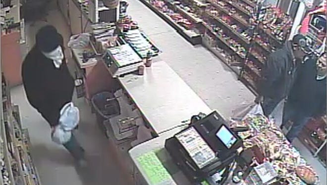 Surveillance video footage of a robbery at the Acapulco Mexican Bakery on Feb. 6.