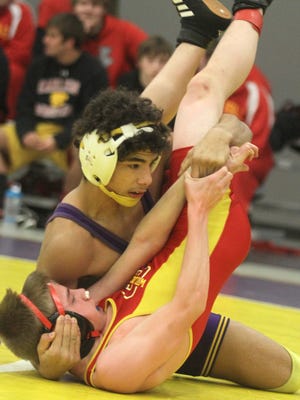 Indianola 106-pounder Kobey Pritchard pins Carlisle's Dez Hummel. The second annual Warren County Duals took place Jan. 5 at the Blake Fieldhouse in Indianola featuring wrestling squads from Indianola, Norwalk, Carlisle, Southeast Warren and Martensdale-St. Marys.
