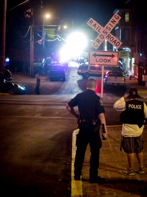 In this file photo, police investigate the scene where a Southern Regional police officer was dragged about 125 feet by a fleeing car on Nov. 4, 2015. John A. Pavoncello photo