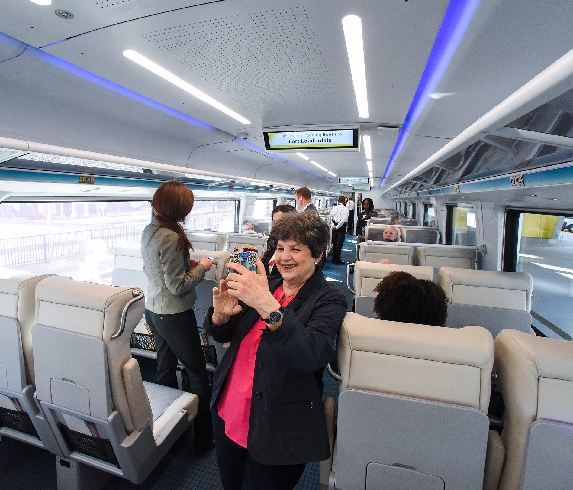 U.S. Congresswoman Lois Frankel takes a selfie aboard Brightline's introductory trip between West Palm Beach and Fort Lauderdale on Jan. 12, 2018, during an invitation-only media preview ride beginning and ending at the Brightline West Palm Beach sta