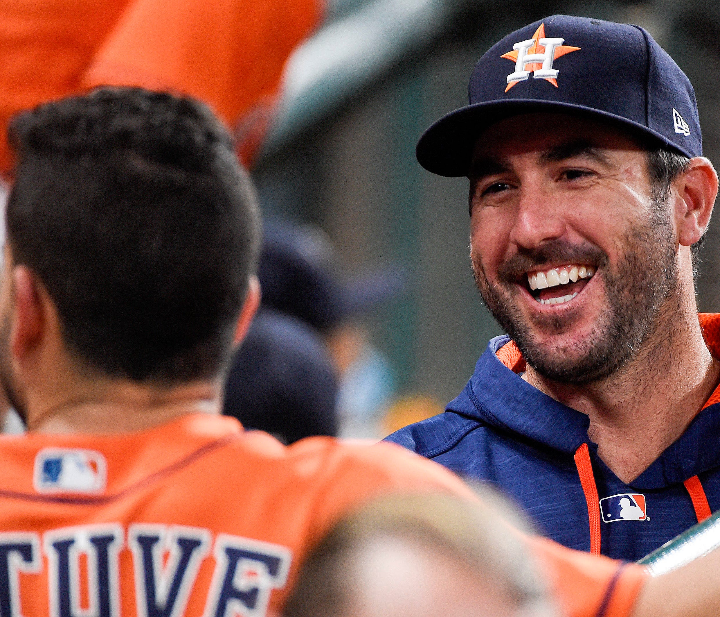 Houston Astros' Justin Verlander, right, laughs while talking to Jose Altuve during the second inning of the second game of a baseball doubleheader against the New York Mets, Saturday, Sept. 2, 2017, in Houston. (AP Photo/Eric Christian Smith) ORG XM