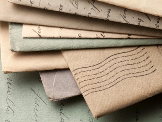 Pile of old letters with envelopes