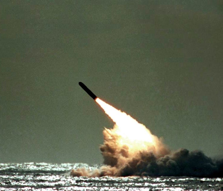 In this file photo dated Monday, Dec. 4, 1989,  a Trident II missile launched by the U.S. Navy during a performance evaluation from the submerged submarine USS Tennessee in the Atlantic Ocean off the coast of Cape Canaveral. According to Britain's Su