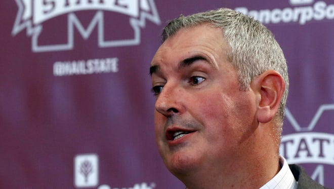 New Mississippi State football coach Joe Moorhead explains what he will be looking for in an assistant coach to reporters and team supporters at his official introduction by the university, Thursday, Nov. 30, 2017, in Starkville, Miss. (AP Photo/Rogelio V. Solis)