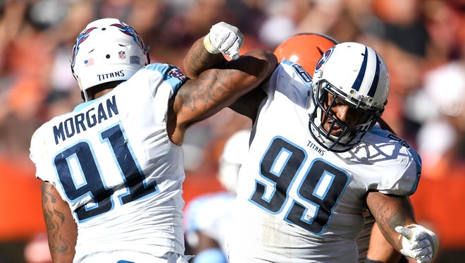 Titans defensive tackle Jurrell Casey (99) celebrates the sack by linebacker Derrick Morgan (91) during the fourth quarter at FirstEnergy Stadium Sunday, Oct. 22, 2017 in Cleveland, Ohio.