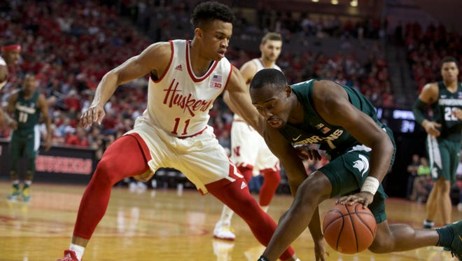 Michigan State's Joshua Langford dribbles the ball as Nebraska's Evan Taylor defends in Thursday's second half. Langford scored nine points as the Spartans won, 72-61.