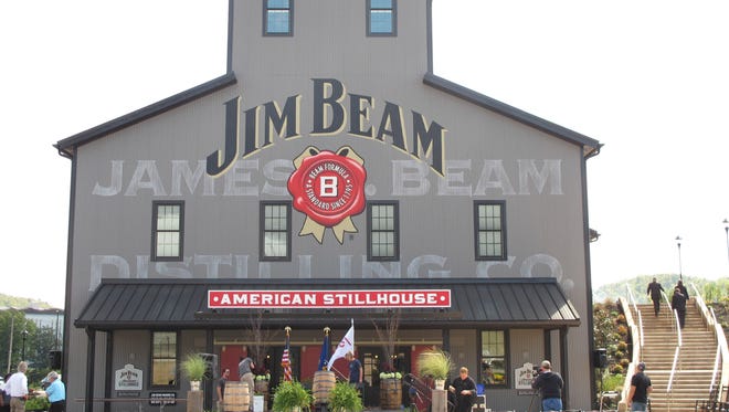 FILE - This Oct. 3, 2012 file photo shows the Jim Beam visitors center at its central distillery in Clermont, Ky.  Tourism in the heart of bourbon country, on the upswing for years, reached a milestone in 2016. Visitors made more than 1 million stops at distilleries along the Kentucky Bourbon Trail and Kentucky Bourbon Trail Craft Tour last year, the Kentucky Distillers' Association said Wednesday, Jan. 25, 2017.