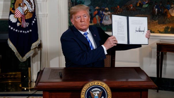 President Trump signs a presidential memorandum on
