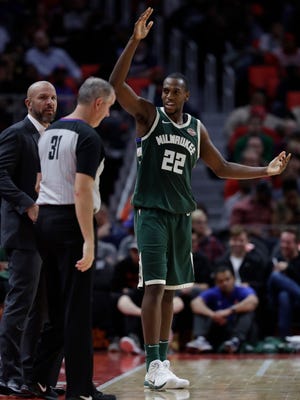 Bucks forward Khris Middleton questions a call by referee Scott Wall during the Bucks' loss Friday night in Detroit.