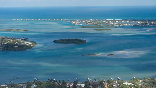 An aerial image shows the St. Lucie River, the Indian River Lagoon, Hutchinson Island and the Atlantic Ocean on Thursday, Feb. 16 in Martin County. 