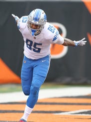 Eric Ebron celebrates after a touchdown against the