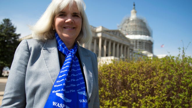 In this March 16, 2016, file photo, Terry Harmon, daughter of WWII veteran WASP (Women Airforce Service Pilots), Elaine Harmon, speaks to reporters after an event with members of congress on the reinstatement of WWII female pilots at Arlington National Cemetery on Capitol Hill in Washington. It took an act of Congress, but World War II pilot Elaine Harmon is finally being laid to rest at Arlington National Cemetery on Sept. 7, 2016. Harmon died in 2015 at age 95. She was one of the Women Airforce Service Pilots (WASP), a group of women who flew military aircraft during World War II so that men were freed up for combat missions.
