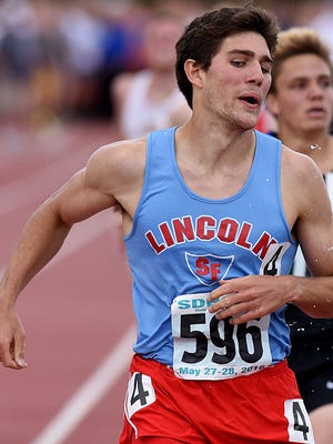 Lincoln's Gabe Peters crossees the finish line in the Class AA boys 1,600 meter run during the 2016 SD State Track and Field Meet at Howard Wood Field on Saturday, May 28, 2016.