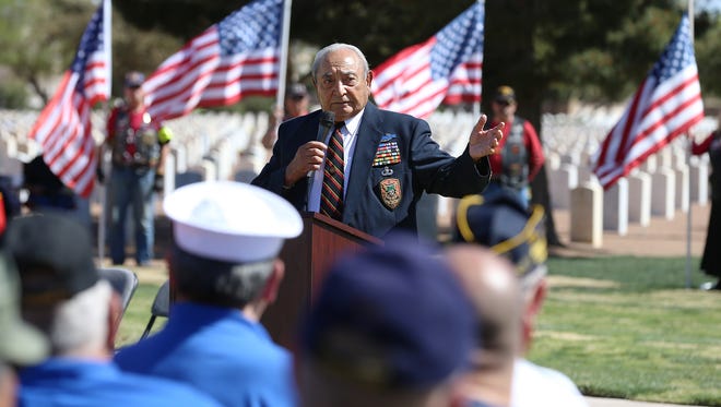 Vietnam veteran and former prisoner of war Isaac Camacho speaks during a ceremony at the Fort Bliss National Cemetery honoring those who served in the war