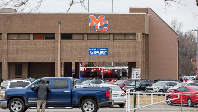 Emergency crews respond to Marshall County High School after a fatal school shooting Tuesday, Jan. 23, 2018, in Benton, Ky. Authorities said a shooting suspect was in custody. (Ryan Hermens/The Paducah Sun via AP)