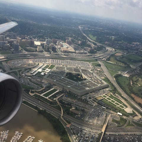 The Pentagon is seen from the window seat of a...