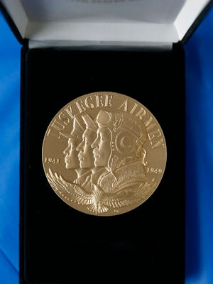 A Congressional Gold Medal appears at the National Warplane Museum in Geneseo, N.Y., for a presentation ceremony for two World War II Tuskegee Airmen Nov. 11, 2016.