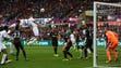 Swansea City's English defender Alfie Mawson  heads