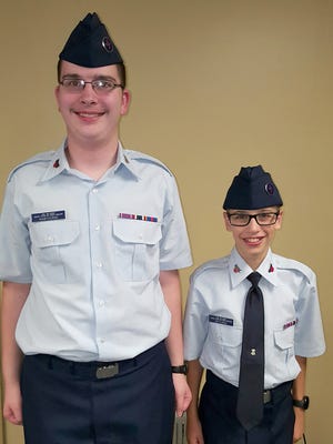 Three cadets of Gettysburg Composite Squadron recently earned awards and cadet promotions. Cadet Staff Sergeant Hawthorne, left, and Cadet Senior Airman Kotlinski attended the meeting night. Cadet Airman Julia Williams is missing from the photo.