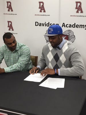 Davidson Academy's Obinna Eze signed with Memphis on Wednesday.