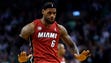 Miami Heat forward LeBron James (6) reacts after scoring