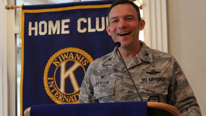 Col. David M. Benson, commander of the 7th Bomb Wing at Dyess Air Force Base, enjoys a light-hearted moment during his talk Wednesday to member of the Kiwanis Club of Abilene.