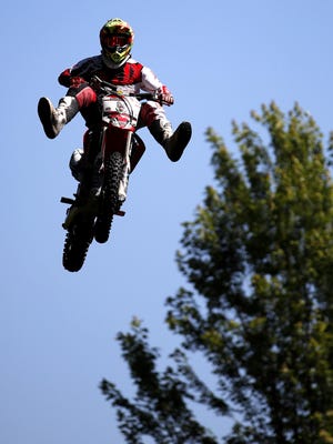 Cody Cavanaugh, with Blessed FMX, performs a trick while riding at Community Fest on July 4 at Riverside Park.