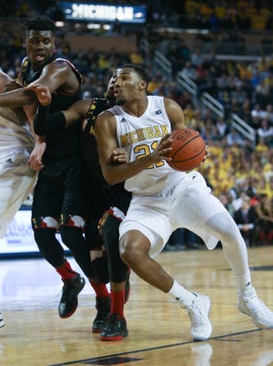University of Michigan Wolverines Zak Irvin drives against the Maryland Terrapins during second half action on Wednesday, January 12,2016 at the Crisler Center in Ann Arbor Michigan.