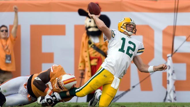 Buccaneers defensive end Greg White sacks Packers quarterback Aaron Rogers during the game at Raymond James Stadium on Nov. 8, 2009 in Tampa, Fla.