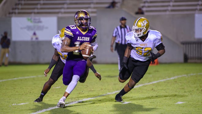 Quarterback Noah Johnson (13) rushes against Alabama State during their game last week. The redshirt freshman could start in place of junior Lenorris Footman against Arkansas-Pine Bluff on Thursday.