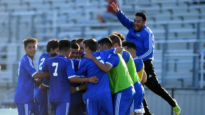 Luis Rivera of Oxnard College celebrates his goal with the bench against San Diego Mesa in the CCCAA SoCal Regional Soccer Tournament at Oxnard College. The Condors won the game 2-0.