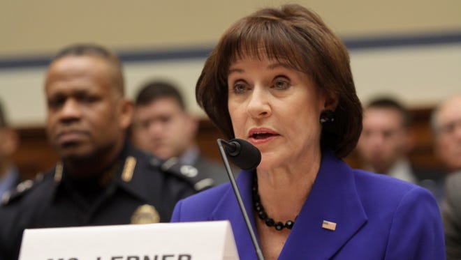 In this March 5, 2014, file photo, former IRS official Lois Lerner speaks on Capitol Hill.