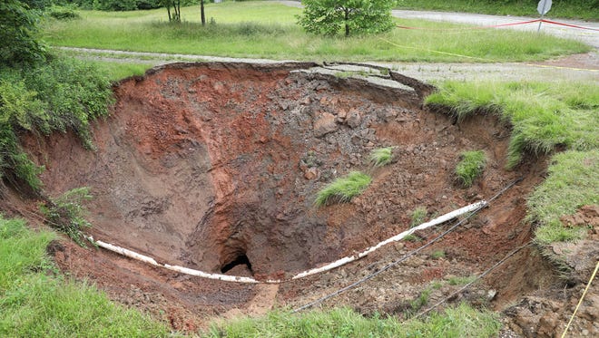 A large sinkhole that formed near the intersection of Bear Township Road 423 and Portie-Flamingo Road near Crooksville last year has been repaired.