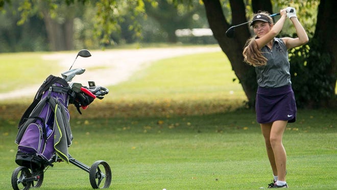 Teddi Bishop takes her third stroke on a hole Sept. 16 at Crestview Golf Course during the Delaware County Girls Golf Sectional.